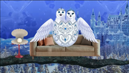 Snow Owls sitting