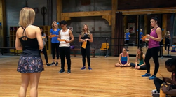 Riley orders the dancers to write their reviews then give them back to her.
