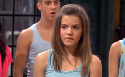 Eldon (background) looks on in awe after Emily rejects her sister from joining her to spy on Elite.