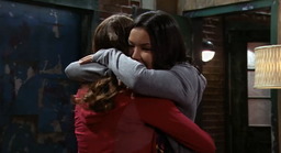 Sloane hugs Amy.