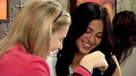 Emily laughs with Stephanie.