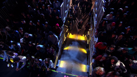 Riley (background) walks up the ramp toward the stage.