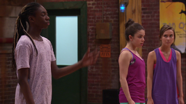 Henry reminds Michelle that the team is two dancers short.