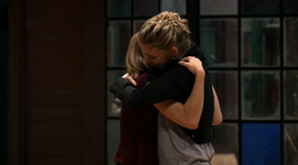 Emily hugs Riley.
