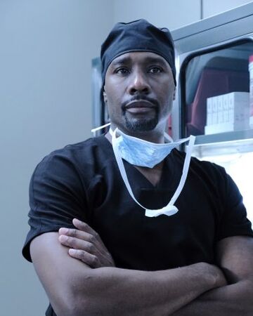 Barrett Cain The Resident Wiki Fandom Cain tries to recruit bell and kit to join him on a dangerous surgery, with the intent of garnering publicity for the hospital. barrett cain the resident wiki fandom