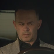 Greg Ellis as Blair Darvill