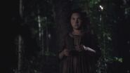 a young Tituba in the woods