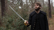 Salem-Promo-Still-S1E06-29B-Cotton Mather-Sword