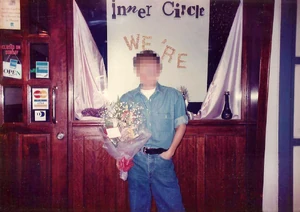 A gay man standing just outside Inner Circle.