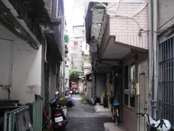 The temple was found at the end of this alley, to the right.