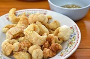 Pork rinds on a plate.