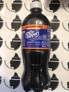 A Photograph of a Dr Pepper Dark Berry 20 oz. Pepsi style bottle.
