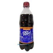 The Dr Pepper Dark Berry 20 oz. Coca-Cola style bottle design.