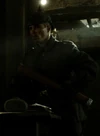 Damon Caro as Courier