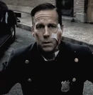 Mike Justus as Sadist Cop