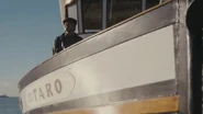 06 Henry on the Taro.jpg (75 KB) Henry Nakayama on his fishing vessel, Taro