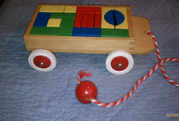 Wooden pull along wagon hot sale