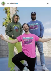 Kelsey in an olive green Hyuck hoodie with Goofy's fat ass, Garrick and Zach in Familia shirts