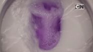Purple flushy toilet