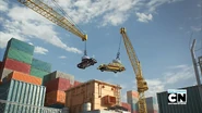 The cranes near the garbage crusher.