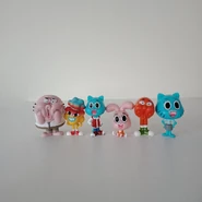Six Gumball figures featuring a varsity jacket Gumball and one classmate