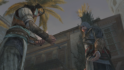 Yusuf mostrando un Gancho a Ezio