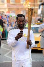 Will.i.am. Tweetin' with the torch!