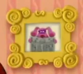 Magenta reading the newspaper