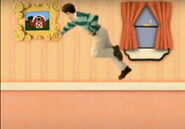 Steve skidoos to the picture frame upside down