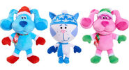 A Periwinkle plush toy in winter clothes with similar Blue and Magenta toys.