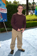 Promotional Picture of Steve Wearing a Maroon Tee Shirt also Tan Pants, And Holding A Camera At the Premiere of "Blue's Big Musical".