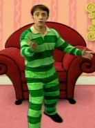 Steve in Green-striped clothes. (Similar to his pajamas)