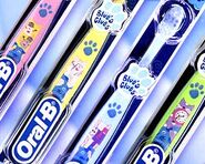 Oral-B toothbrush (farthest right)