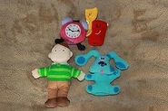 Finger puppet (top left)
