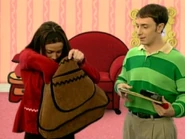 Miranda is looking into her bag.