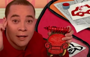 Kevin wears Joe's red-squared shirt are buttoned up and the black crayon with a red checkered wrapper