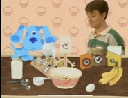 Spatula She put one cup of sugar into bowl