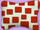 Pillow Has White and Red Squares