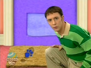 A human footprint, which is the 2nd clue, on the doormat.