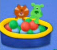 Orange and green puppy balls