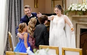 Douglas with adoptive parents Hope and Liam