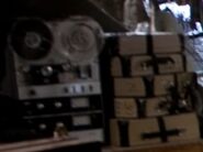 A tape recorder in a behind-the-scenes photo of the cellar from Martin Whist, bearing a resemblance to the tape recorder with readings from the Necronomicon in the original Evil Dead.