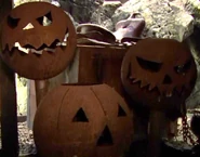 The stack of jack o'lanterns in the cabin's cellar.