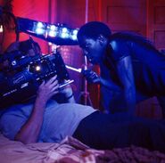 Laurence Mason on the set of The Crow filming a flashback scene
