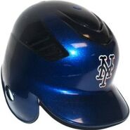 The Coolflo helmet with it's blue and black shelling with the NY in blue with backdrop shadow of orange. It was also known as a two-tone helmet although it did not match the two-tone cap. This was used with batting practice and during games. It was worn from 2006-2011.