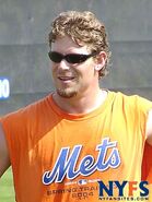 The orange Mets spring training 2004 shirt.