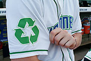 The recycled jersey. The recycle sign on the right. The Cyclones in light green and blue. There is nothing on the left sleeve.