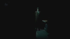 The Curator on the loading screen.