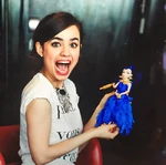 Sofia with a doll of Evie.