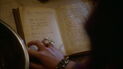 Mal looking at the love spell recipe